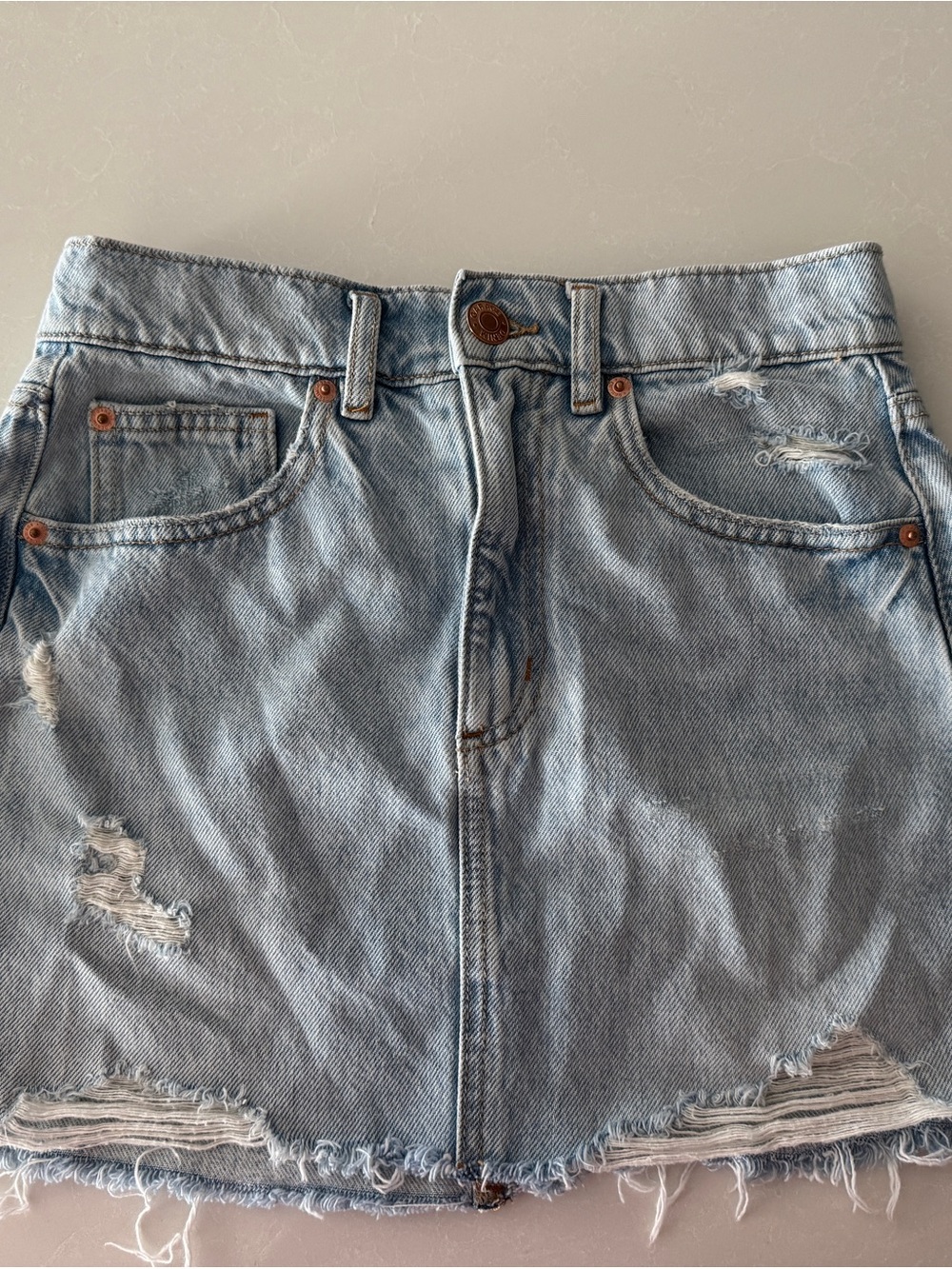 Garage Light Wash Distressed Denim Mini Skirt